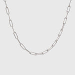 Silver Paperclip chain on a light gray background