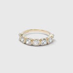 Coco wedding band in 9ct yellow gold with 3.5mm lab-grown cushion-cut diamonds in softly irregular tube settings
