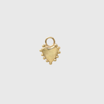 A small gold heart-shaped charm with a textured finish, a loop at the top, and small bead-like details along the bottom edge, centered on a light gray background.