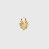 A small gold heart-shaped charm with a textured finish, a loop at the top, and small bead-like details along the bottom edge, centered on a light gray background.